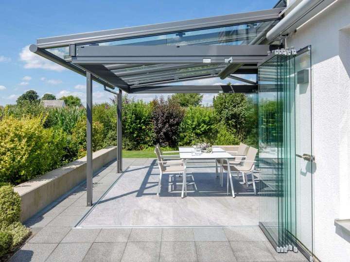 Glashaus an einem Wohnhaus